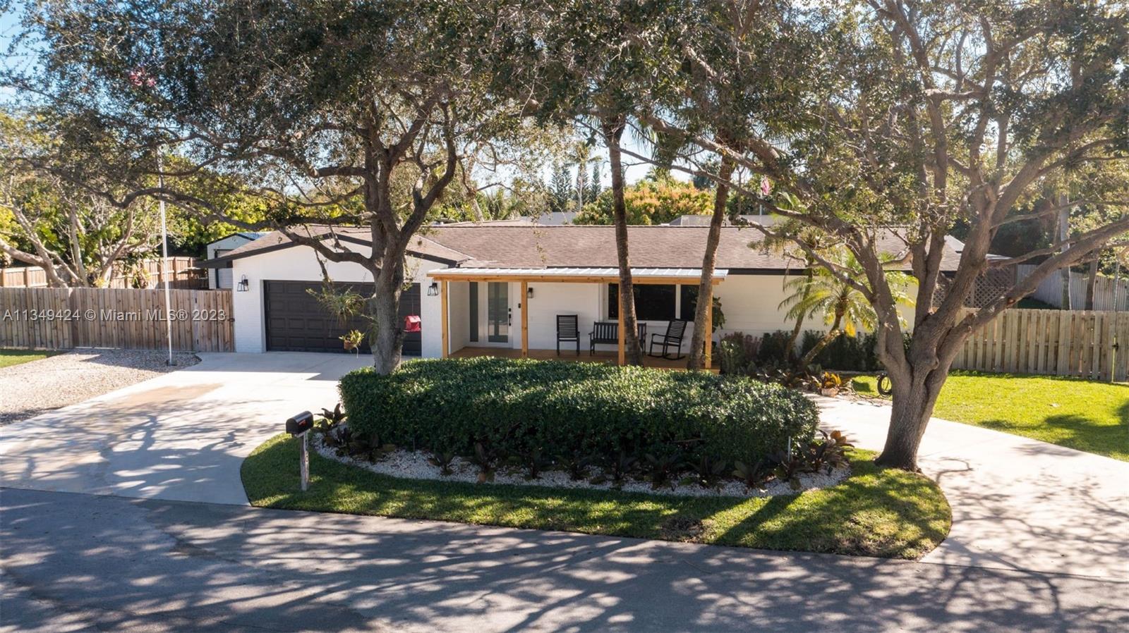 Beautiful 4 bedroom, 2 bathroom home with screened-in pool located in Palmetto Bay. Updated in 2022 with new flooring throughout, new kitchen with large kitchen island, new spacious butlers pantry, updated bathrooms, and 2 car garage. New hurricane impact windows, accordion shutters, large custom shed, and MUCH more! Home sits on a large, fully fenced yard with ample room for boat or RV parking with RV hookup. Walking distance to Palmetto Bay park! Great area to raise a family with the best schools. Definitely a must-see!