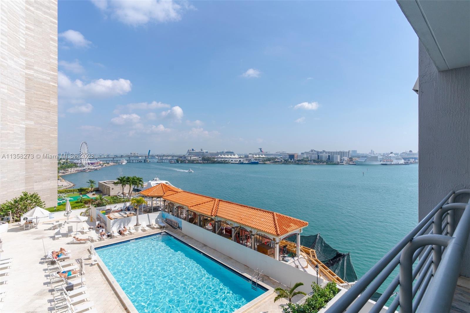 PRICED TO SELL. Beautiful 1 bedroom | 1 bathroom unit with gorgeous views of Biscayne Bay. This contemporary apartment boasts 24“ x 24“ marble tiles throughout, blackout shades in the bedroom, Whirlpool kitchen appliances, whirlpool washer and dryer, and impact-resistant sliding doors and windows. One Miami is a waterfront building with protected views perfectly located in the middle of Brickell and Downtown. Gated entrance and a luxurious lobby with 24-hour door attendants. Other amenities include two pools, a hot tub, two gyms, a club room, a sauna, and Restaurant Il Gabiano by the lobby.