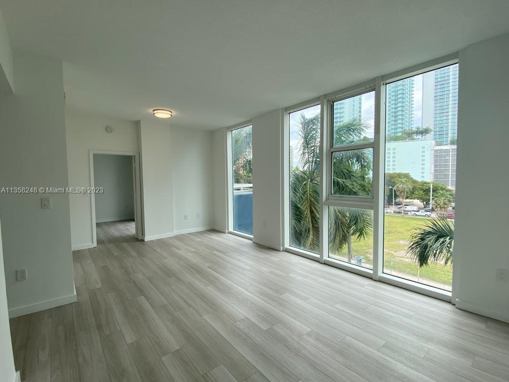 Completely Renovated, Brand new 1B/1B + DEN. Huge Terrace. Short Distance to the Performing Art Center, Margaret Pace Park, multiple dining options, and 15 min to the Airport. Gym, Concierge, and Wifi are included. You must see it!!!