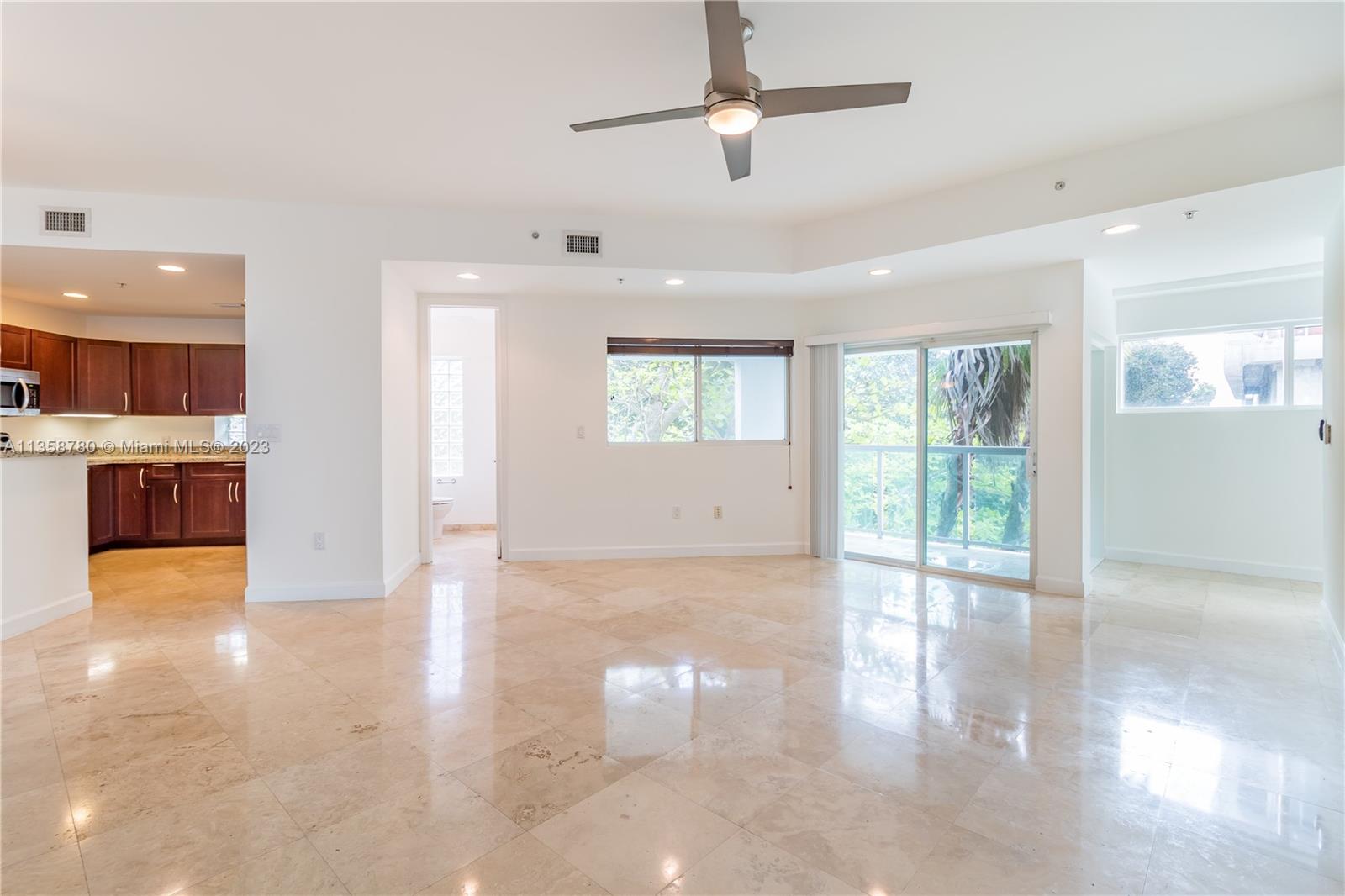 Extremely spacious 2 bed 2/1 bath residence in the heart of Coconut Grove, steps away from main attractions, restaurants and shops. Open concept kitchen, spacious dining room and living area with balcony attached. Stunning primary bedroom includes a spacious walk in closet with custom built-ins as well as a large double sink bathroom with both bath tub and shower. Second bedroom includes a walk in closet and private bathroom. Washer and dryer in unit. Comes with a parking space and includes a hydronic lift for second car.