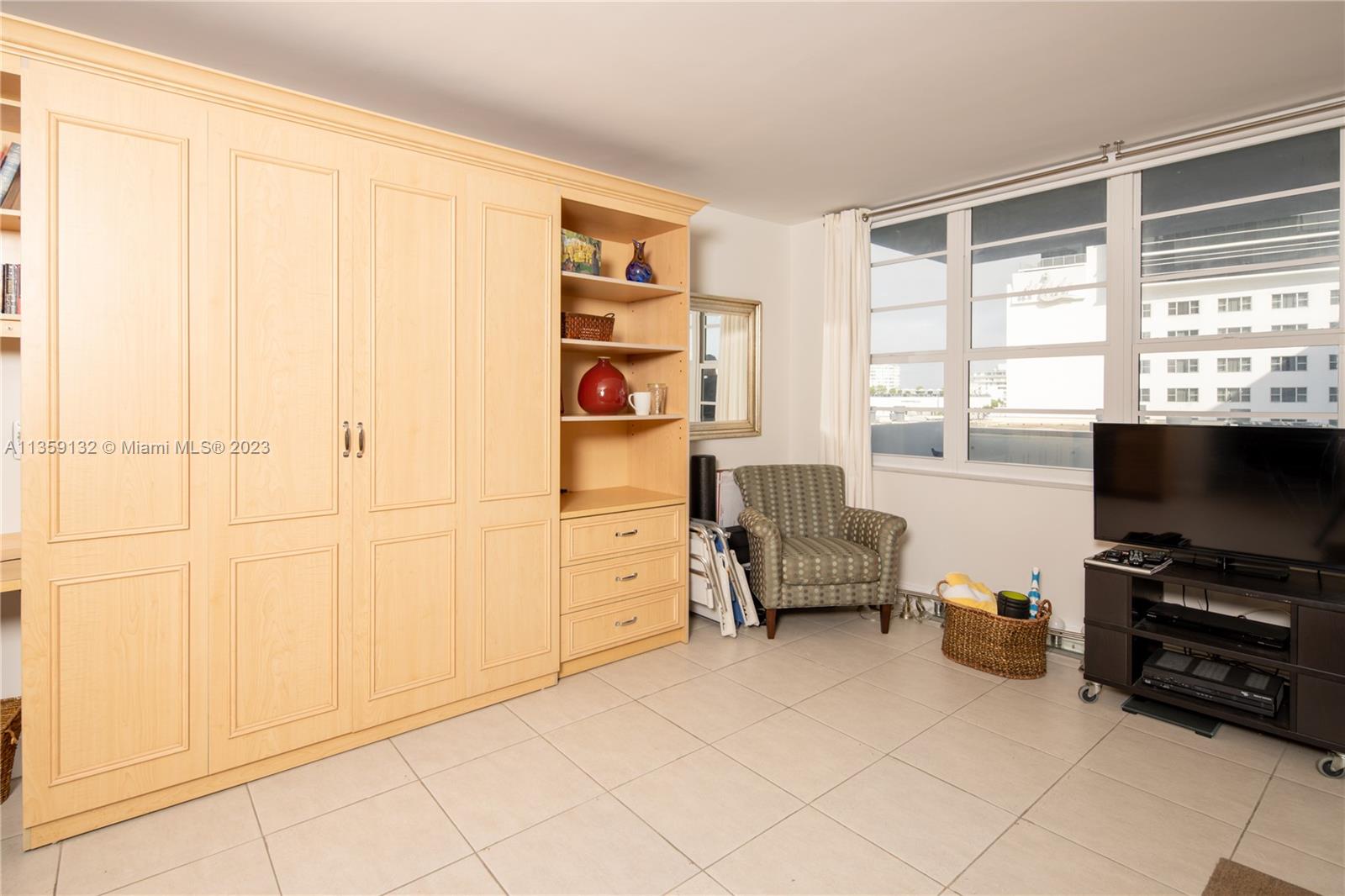 Murphy bed up along with built ins.