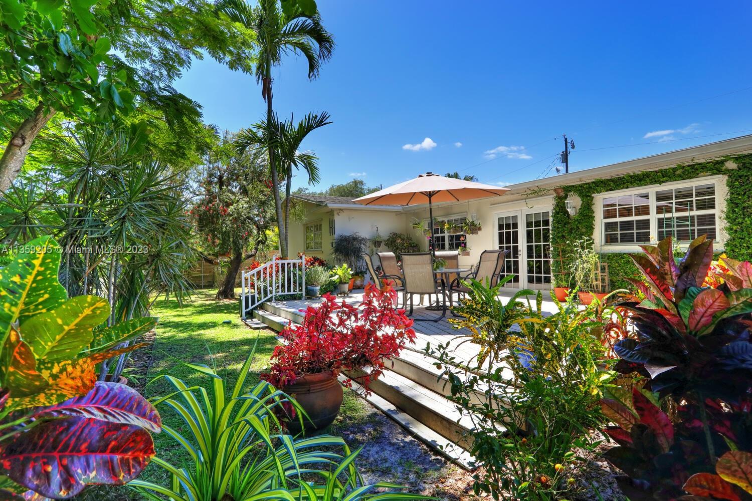 Move-in ready 3 bedroom/2 bathroom plus an office that can easily be converted to a 4th bedroom.   Enjoy abundant light throughout the day in this spacious home. Located on a quiet South Miami street only a mile from downtown South Miami, the privacy of a landscaped garden overlooking a serene waterway is so peaceful.  Gorgeous hardwood floors, expansive white galley kitchen with ample cabinet space & Corian countertops. Two car garage, circular drive with plenty of parking, oversized family room with french doors leading to patio/deck, roof approximately 8 years old, A/C 1-year-old, large utility room, large backyard deck overlooking the canal.