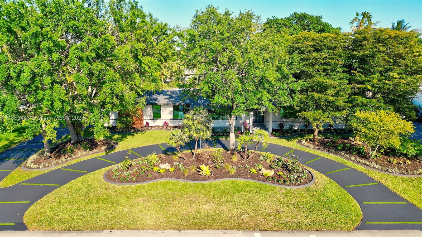 This luxurious home is the epitome of elegance and sophistication.  The only home completely renovated in the beautiful community of Palmetto Bay, new plumbing, new electric , new impact windows, doors, and flat roof, all done with PERMITS. Flawless finishing throughout with top-of-the-line kitchen with quartz countertops and back splash new appliances, gas cooktop, high end bathrooms, and beautiful porcelain tiles.  The outdoor space is just as impressive, with a stunning resurfaced pool, lush gardens, and a huge patio area.  North of 168th St - extremely close to great A-listed schools, Coral Reef Park, and shopping & dining. An added bonus is a Generac full home 20KW Generator.  3D VIDEO AVAILABLE.