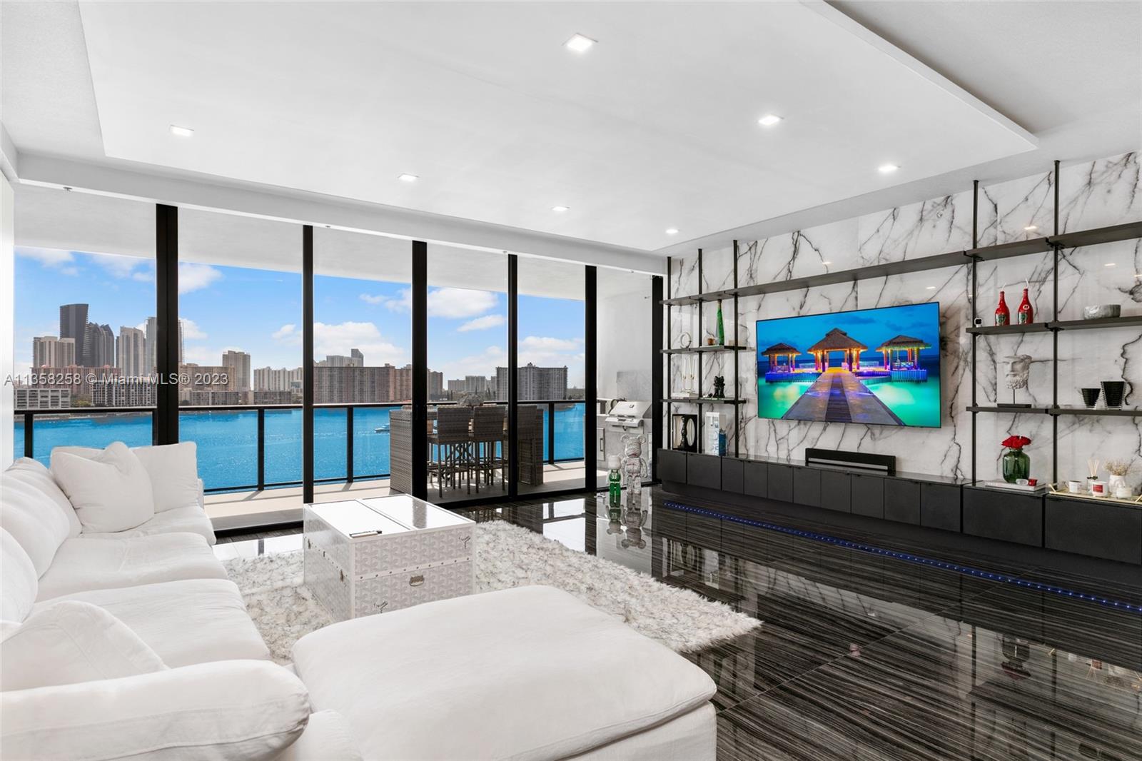 It's no secret why Prive is one of Aventura's most sought after buildings! With $650k spent in recently completed renovations, the moment you step into your private foyer entrance, you are embraced with 10' ceilings, an open floor plan, crystal blue water views, luxurious chef's kitchen with top-of-the-line appliances, three spacious en-suite bedrooms plus den, and two terraces providing more than 850 feet of outdoor balcony space with ocean and bay views plus a summer kitchen, two parking spaces and two storage units. Nestled behind two sets of guard gates, Prive sits on a private 8-acre island and offers 5-star amenities the whole family can enjoy. The epitome of privacy and luxury awaits.