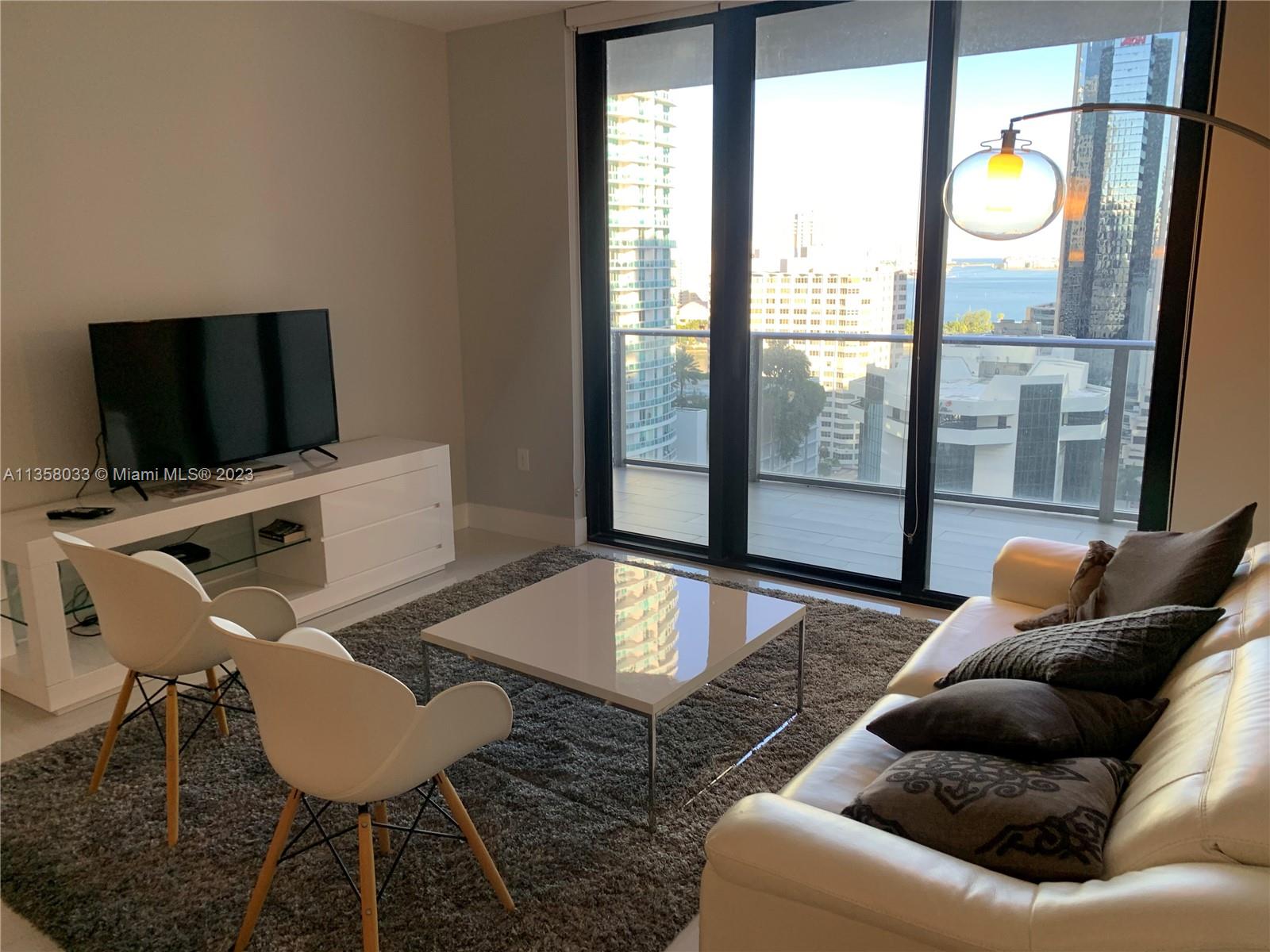 Tastefully decorated and furnished apartment. Featuring water view, modern kitchen and bathrooms, white porcelain floor and enclosed den. 1010 Brickell has the best amenities Brickell has to offer such as roof top pool, indoor pool, jacuzzi, spa, roof top lounge with barbecue and outdoor theater, racquetball and basketball courts, soft jogging trail, bowling alley, ping pong, x-box, golf simulator, pac-man machine, state of the art gym, kids room with climbing net and climbing wall, kids water park area. It is like living in a club. Den converted into 3rd bedroom.
***AVAILABLE JUNE 1ST***