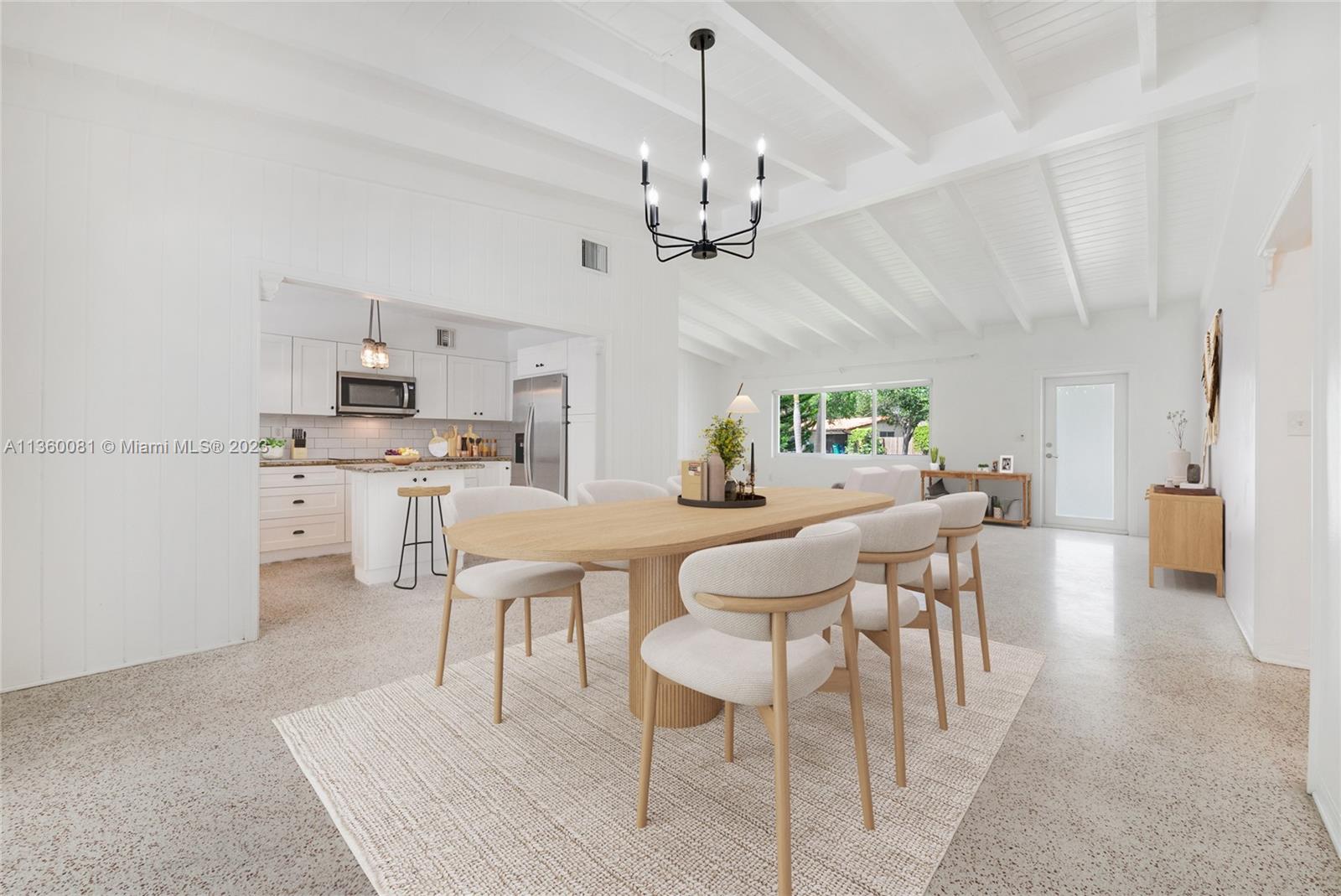 Located in the heart of Pinecrest, this 3 bedrooms house + 1 extra efficiency/office/in laws sits on a generous & private lot.  High vaulted ceilings with bright light flooding spaces from all impact windows and doors, white wood paneling, seamless gleaming terrazzo floors give a sense of well being and flow.  Entertain while cooking in an open kitchen with white wood cabinets, granite countertops, stylish subway tile & a convenient island.  Enjoy a candlelight diner under the covered screened porch in front of the pool or relax outside in the privacy of your secluded garden. Enjoy 3 remodeled full bathrooms including one in efficiency/office/in laws extra room, generous closets sizes and a two car carport with extra storage space. Pool and yard maintenance included. Fenced yard.