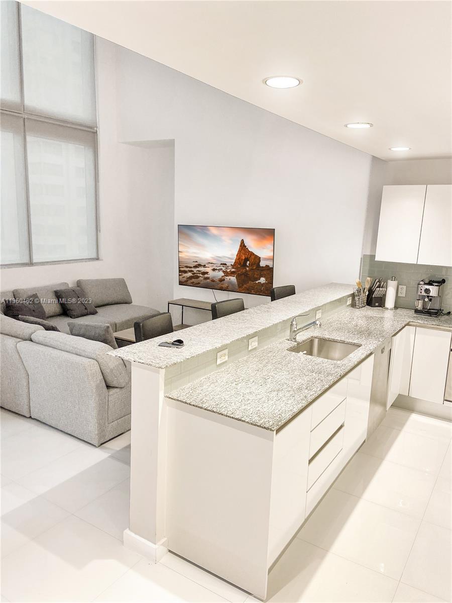 Remarkable Furnished 2 Level Unit. Located in the heart of Brickell Ave, Renovated, and decorated with exquisite taste. Modern furniture 1 Bedrooms 2 full marble bath. Ready to move in. 1 assigned and covered space on same floor. Walking distance to all financial centers, great restaurants, amazing nightlife, and Metro-rail. This luxury building has 24-hour valet, concierge, gym with massage room, spa, cigar and wine room. Entertain friends with all the amenities this great building provides. Building offers state of the art gym, Jacuzzi, business center, management on site, concierge, security valet, beautiful pool, and walking distance to shops, restaurants and Metrorail.