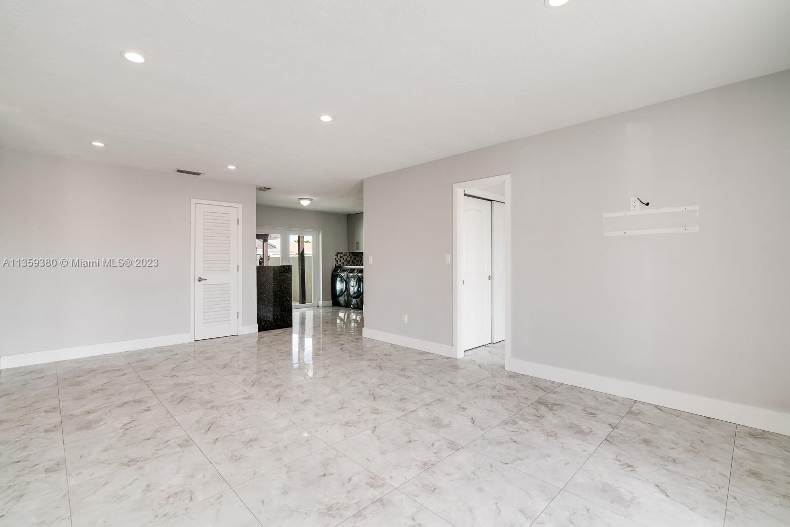 If you look on the wall to the right you can see the cable wire and where your new TV will be installed! At the end of the livingroom and dining area is the begining of the kitchen area.