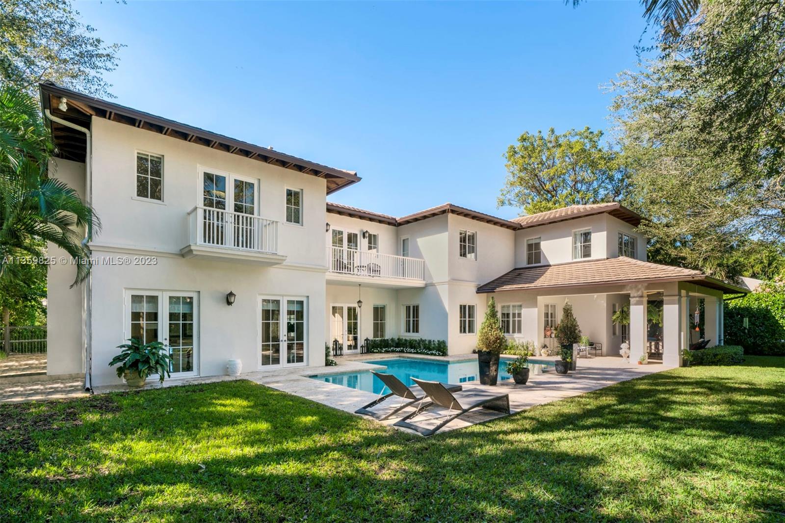On a quiet and gated 12,500 SF lot in the desirable High Pines area, this spectacular two-story, 7,259 SF 6-BD and 6.5-BA home is filled with natural light and casual elegance. Egyptian stone and wood floors carry across the
spacious living and family areas, including two family rooms and an office/library. The open kitchen comes with
custom Italian cabinets, gas range and wine fridge. A spacious primary bedroom suite has 1,000 SF, and all the
other bedrooms have ensuite bathrooms and walk-in closets. The lushly landscaped yard compliments a serene
pool surrounded by coral stone pavers and covered patios. Close to South Miami’s shops, restaurants, Merrick Park and Miracle Mile. A short Metro-Rail ride into Downtown and Coconut Grove. Near top rated public and private schools.