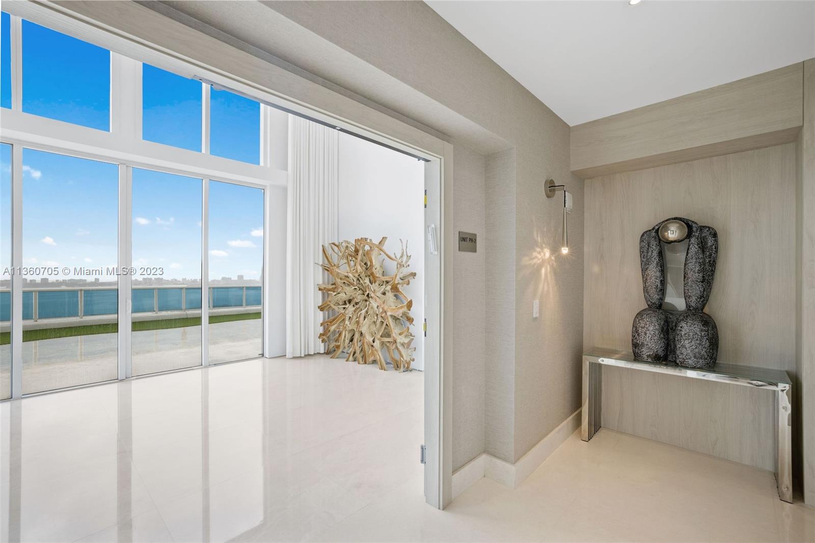 This standout 2-story Penthouse is like living in a single family home with the convenience of condo lifestyle. Enjoy the expansive 4,500 sqft terrace with sky sweeping views of sunrise over Biscayne Bay to sunsets of the West, complimented with 6,291 sqft of interior space. Master suite alone is one like you’ve never seen, with jaw dropping floor to ceiling windows and runway like master closet. With detail oriented finishes and luxurious appliances, the minimalistic neutral feel is suitable for the most eccentric buyer. At home theater is an addition to your 3 bedrooms to mix and match your living corridors. Located in the booming neighborhood of Edgewater, you’re minutes away from Brickell, Wynwood, Miami Beach, FTX Arena, and Miami Intl Airport
