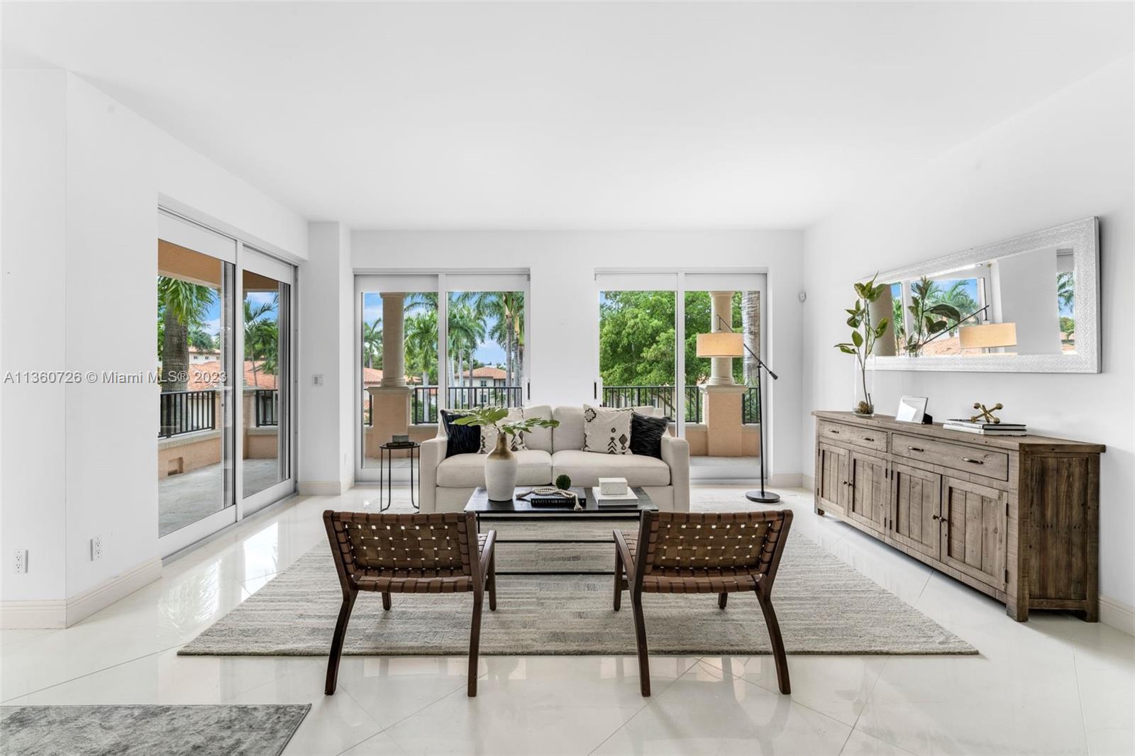 Beautiful 2-bedroom, 2.5-bathroom 2,620 SF condominium in coveted Deering Bay, with its unique country club lifestyle well removed from fast-paced city living.  Ample space for entertainment including an open living/dining space and media room.  Eat-in kitchen with breakfast nook.  Large principal suite with two walk-in closets, well-appointed bathroom, and en suite den suitable for an office and/or library.  Amenities of the Club include a beautifully manicured 18-hole golf course, clubhouse with restaurant, spa, marina, tennis courts, and pools.  Conveniently located paradise for those who do not want to live in the city.