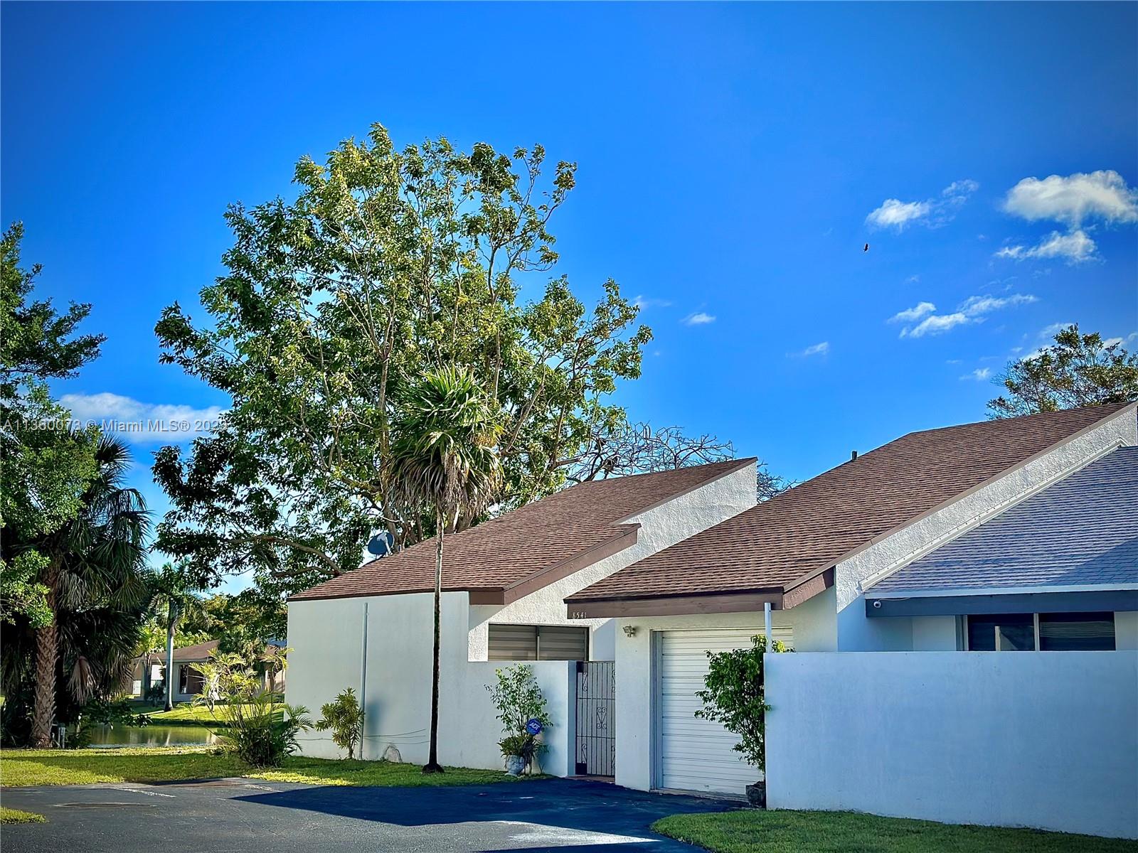 Spacious home in SeaGrape gated community. This Home features has 3 bedrooms and 2.5 bathrooms, it is completely remodeled with brand new appliances, has vaulted ceilings, large sq. footage, plenty of terrace space and a large extra room that could be used as an office, study or storage room. It also has beautiful lake view. Home is centrally located and in great condition. Bring your clients today to view this charming home.

SEE ATTACHMENTS'!!!