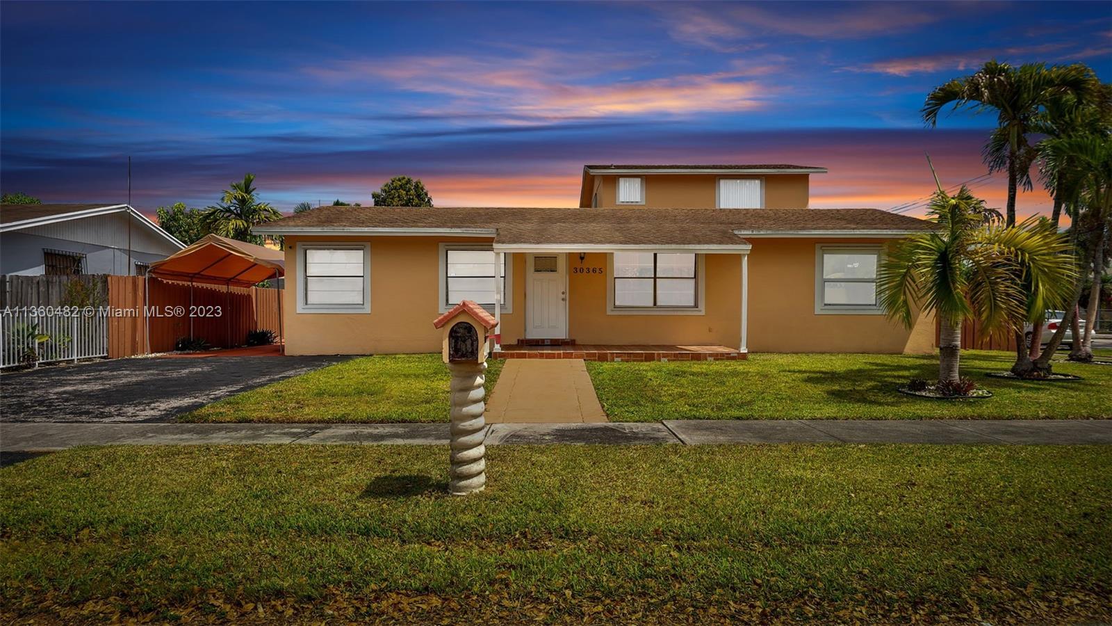 This full home is a 5 bedroom, 3.5 bathroom home.  Home is split in two units.  Main house is a 3 bedroom, 2 bathroom home while the attached 2 story townhome is a 2 bedroom, 1.5 bathroom home.  The attached townhome is currently leased month to month at a rate of $1200 to a great tenant that can be kept in house.  The unit can easily open up to convert to a full 5 bedroom home.  This is an incredible find in Homestead.  Roof is only 5 years old. 1 of the AC units is new and the other has been rebuilt. Close to Homestead Baptist hospital, restaurants, schools and so much more.  Home is on a desirable corner lot with easy access to the Florida turnpike.