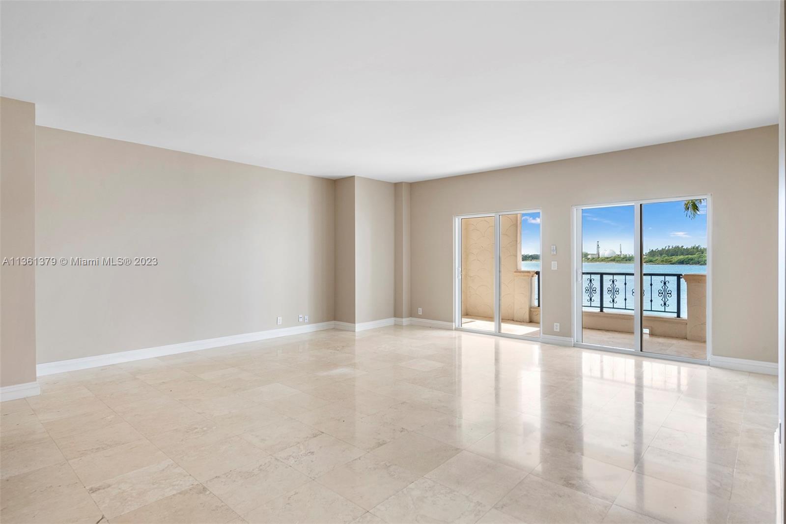 Visit this lovely Bayside Village rental encompassing 3 bedrooms & 3 baths with beautiful SW views of Downtown Miami, Virginia Key and Biscayne Bay. Available for long-term rental unit is offered UNFURNISHED. Features include: marble and wood floors throughout, updated kitchen with wood cabinetry, granite countertops, stainless steel appliances, updated bathrooms, new impact glass doors throughout, window treatments, a private terrace and walk in closet from the master bedroom. It includes 2 assigned parking spaces, 1 golf cart, 1 golf cart assigned parking space and 1 storage. Live the Fisher Island lifestyle in this lovely unit. Easy to show!