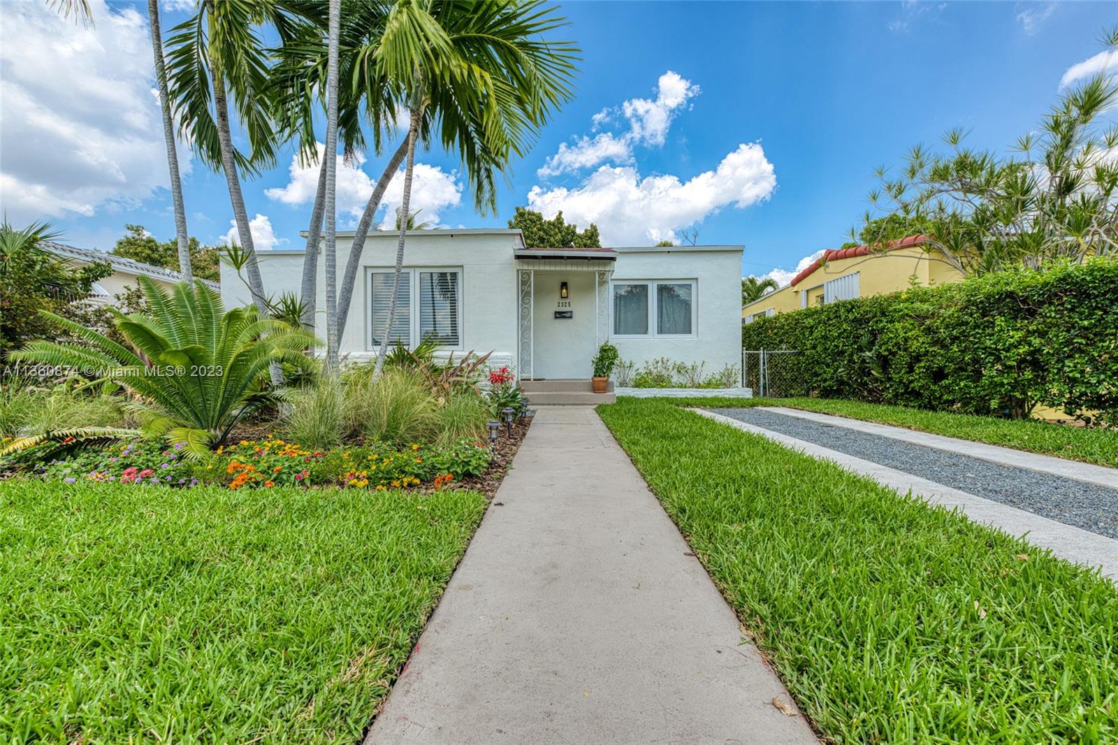Welcome home to this well-maintained Silver Bluff home that includes original hardwood & terrazzo floors, custom millwork, and a spacious family room w/ high ceilings & abundant natural light. Tastefully renovated bathroom w/ handmade Spanish tile & designer fixtures. Functional kitchen with SS appliances, farmhouse sink & gas range. The backyard is a tropical getaway with room to expand or add a pool. New roof 2016, along with new impact windows. Centrally located minutes away from Coconut Grove, Downtown, and Coral Gables. Walking distance to restaurants with a short drive to MIA airport. Close to public transportation, including the Metrorail. Wide tree-lined street with street parking.