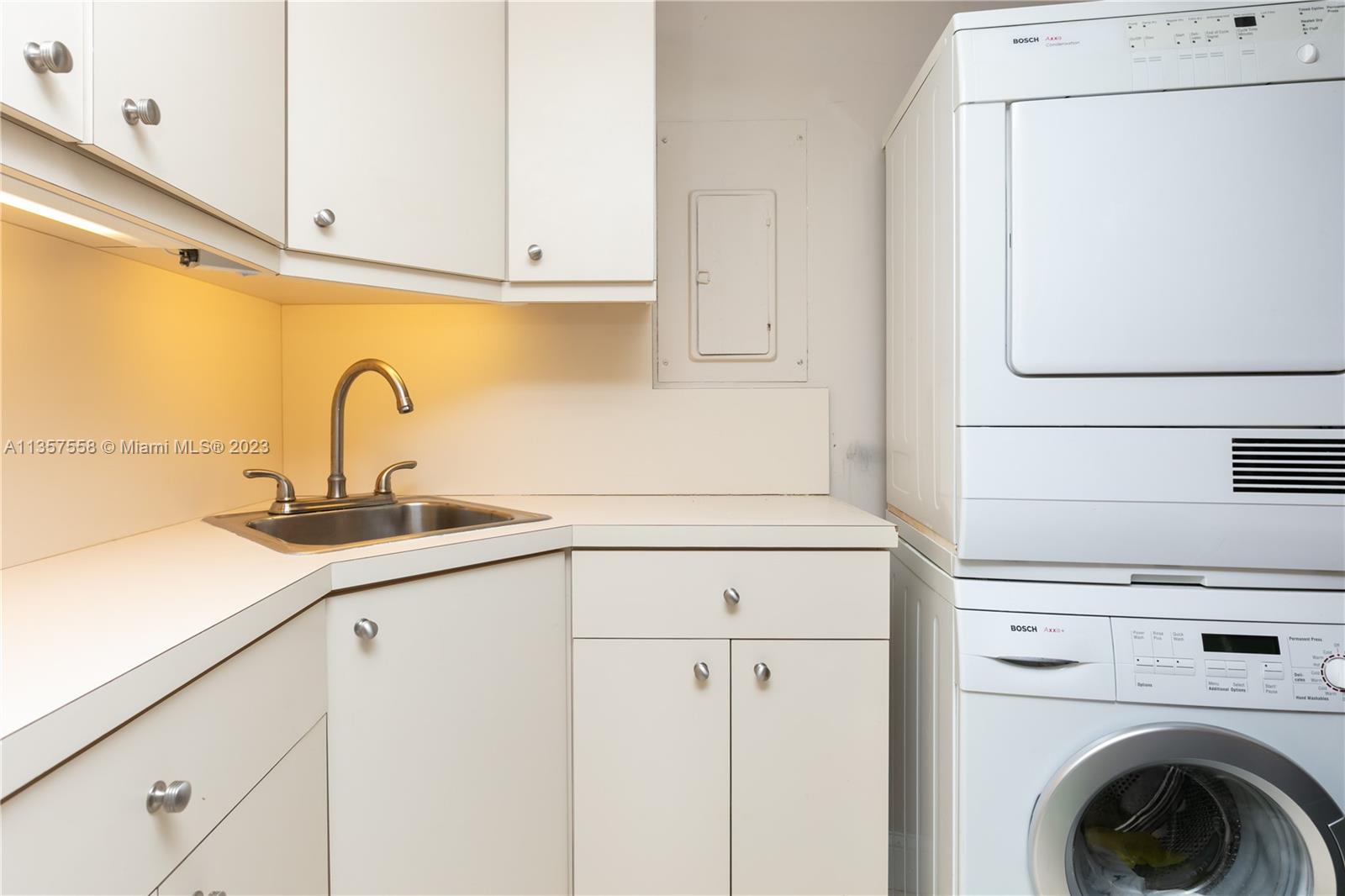 Laundry with Cabinets & Shelves