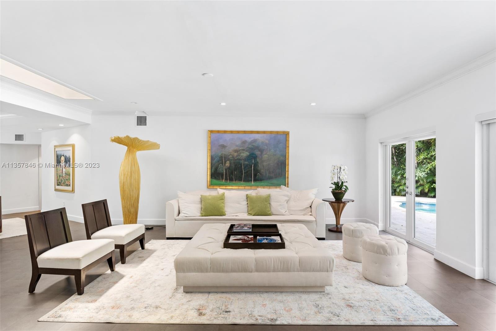 Located on a lush, tree filled, almost 1 acre, corner lot, this timeless residence exudes elegance and taste. Fully updated and located on historic Old Cutler RD. The excellent floor plan – perfect for a family - includes four large bedrooms including 2 primary suites perfectly spread over 3,796 SF of living area.Hi- lights include home office, walk in pantry with wine cooler, carport large for three cars and stunning grounds. Enjoy being minutes away from the best area schools, parks and marinas.