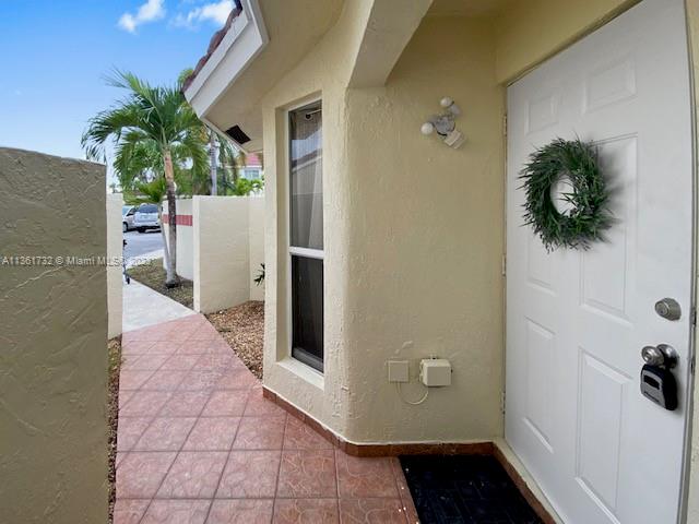 Corner unit with spacious backyard! This home is great for a first time home buyer, empty nester, investment property. Low HOA and conveniently located close to the keys, shops, and more. Won't last!