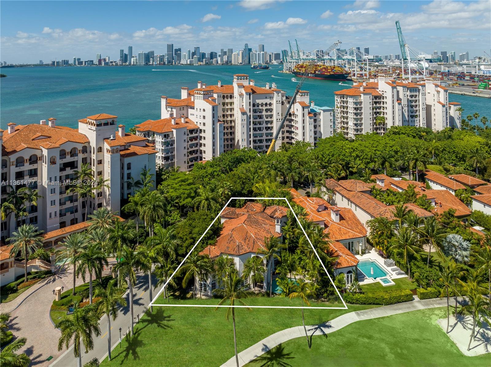 Indulge in resort-style living in this tropical paradise on Miami Beach’s exclusive Fisher Island! One of only 21 single-family homes on the island. This remarkable residence is peacefully tucked amid towering palms and lush tropical foliage. Through the columned entryway, discover an interior that exudes timeless elegance & sophistication. From the textured tones and detailed crown molding to the opulent chandeliers and gleaming marble flooring, there’s a lot to love. Graceful archways seamlessly connect to the family room, adorned with a stately fireplace and French doors framing pool views. A tranquil escape awaits you outside as you relax in the pristine pool and spa overlooking magnificent vistas. Ready to experience the dream coastal lifestyle you crave? Approx sq ft 7,137 per owner.