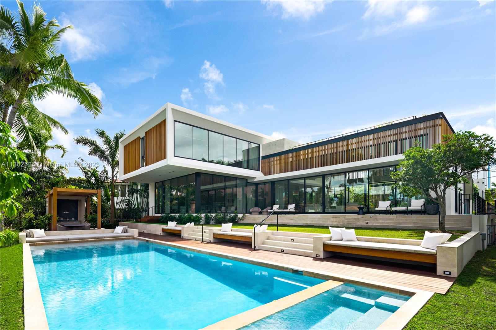 The best pre-construction deal for a waterfront single-family home in Miami Beach! Developed by Todd M. Glaser with architecture by Kobi Karp, this modern masterpiece will comprise approx. 8,500-SF of living areas, 7 bedrooms, 8 baths, luxe amenities, pool, high-end finishes, and more. The home will be situated on an oversized 21,600-SF lot with 100 feet of prime waterfrontage with east exposure and immediate access to the bay – ideal for boaters. Experience luxury living on gated Allison Island - an exclusive community of only waterfront homes - located 2 blocks to the beautiful beaches and La Gorce Country Club, and a short drive to Bal Harbour, Sunset Harbour, Design District, and airport. Seller financing available. Also, for sale as a vacant land at $8.95M