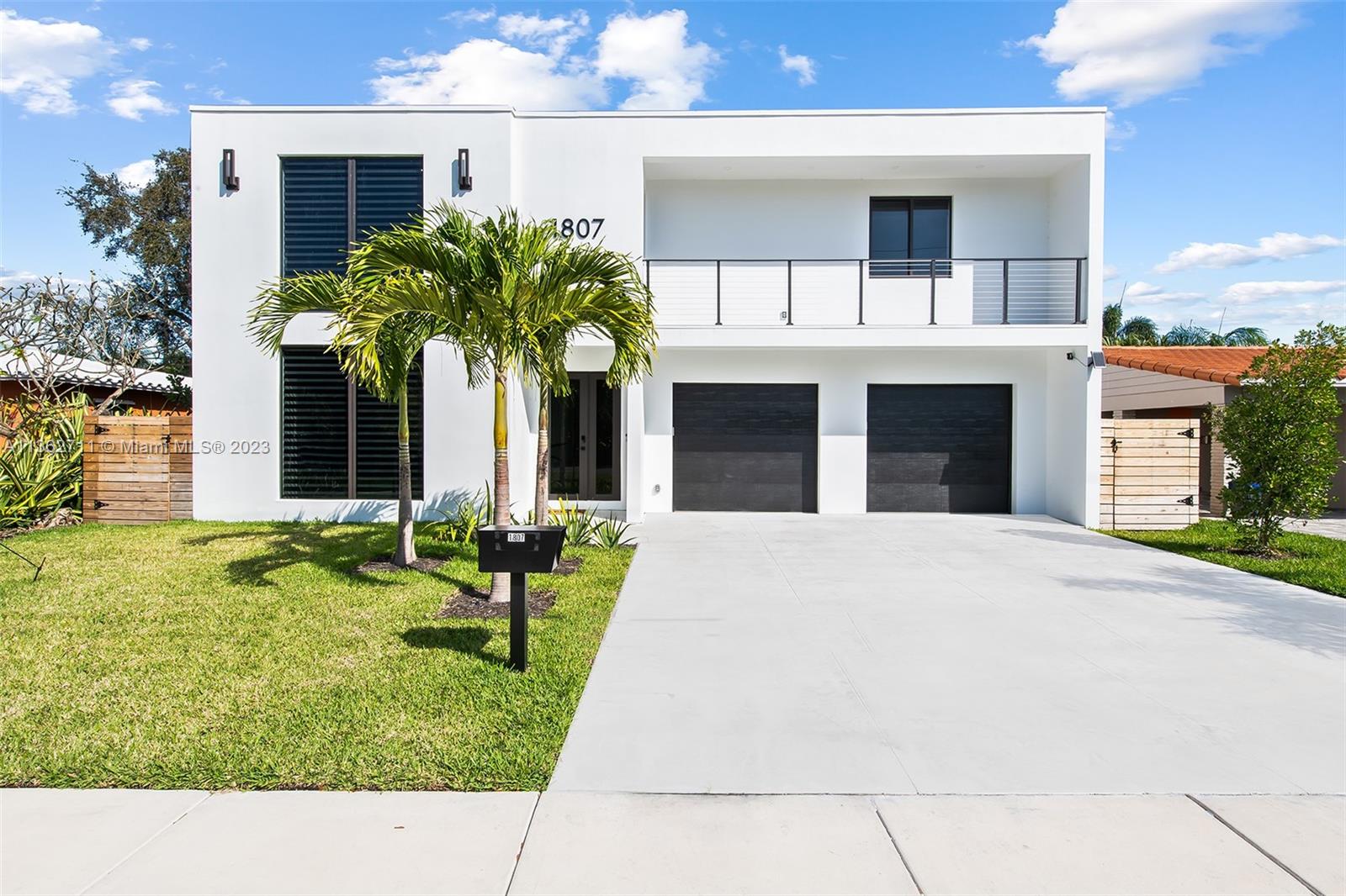 Elegance and modern living await in this 4-bed, 4.5-bath Fort Lauderdale home. With high ceilings, abundant natural light, and a mother-in-law suite on the first floor, this property offers spacious and versatile living spaces. The open-concept kitchen, complete with a butler's pantry, walk-in pantry, Jenn-Air appliances, and waterfall countertop flows seamlessly into the rest of the home. The master bedroom features a private balcony and the backyard boasts a saltwater pool with a sunshelf. Sold furnished, this private oasis is within walking distance to shops and just 2 miles from the beach. No HOA or rental restrictions. Airbnb friendly with the potential for tons of income.