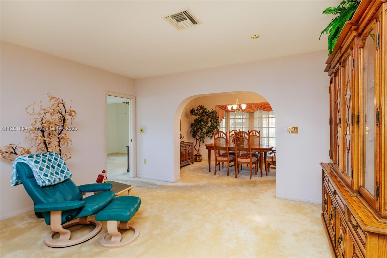 from large living room looking onto dining room