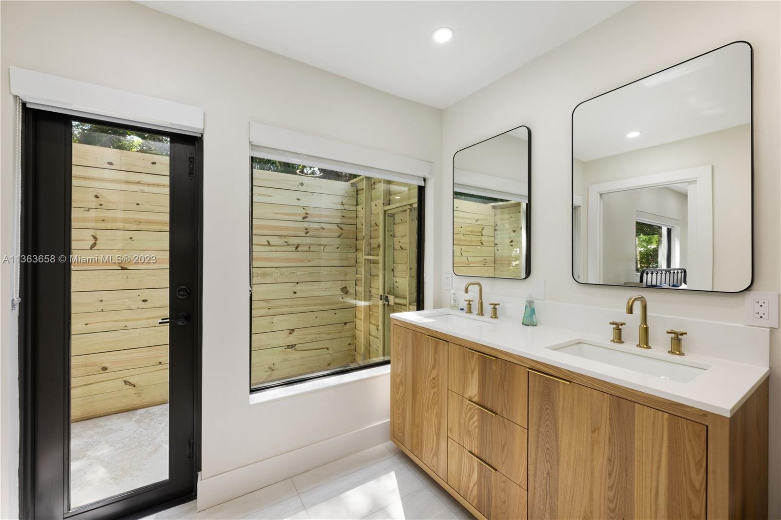 Second master bathroom with plumbing and enclosure for outdoor​​‌​​​​‌​​‌‌​‌‌​​​‌‌​‌​‌​‌​​​‌​​ tub/shower