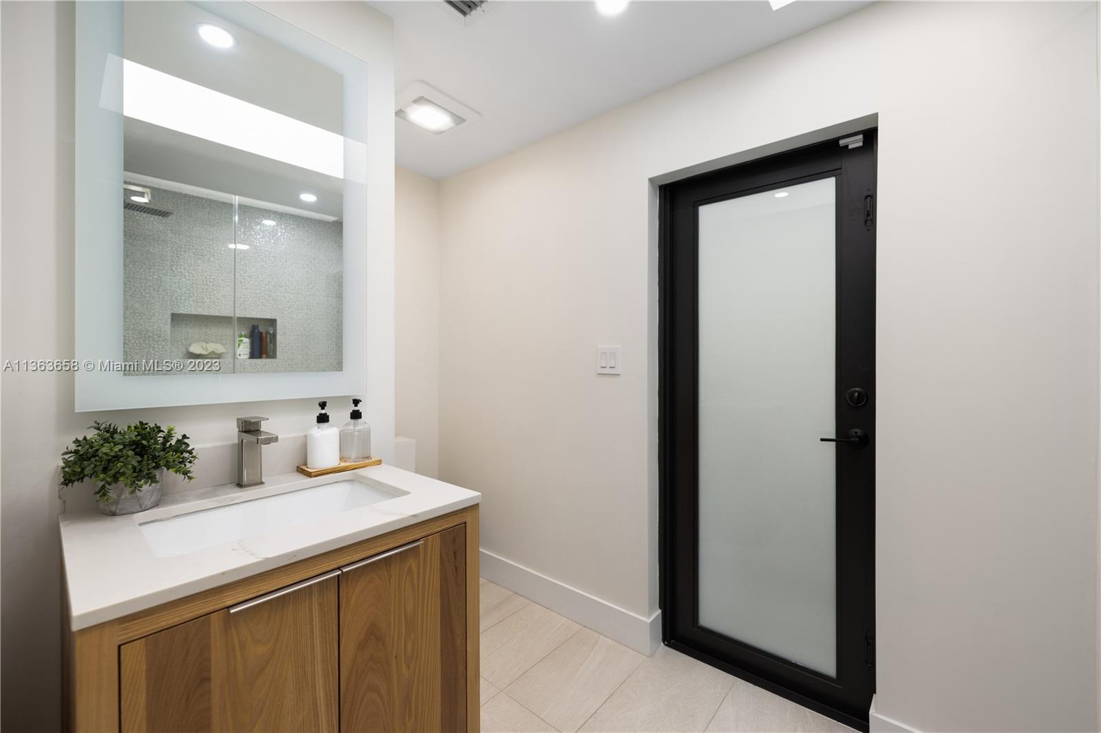 Guest bathroom with pool access