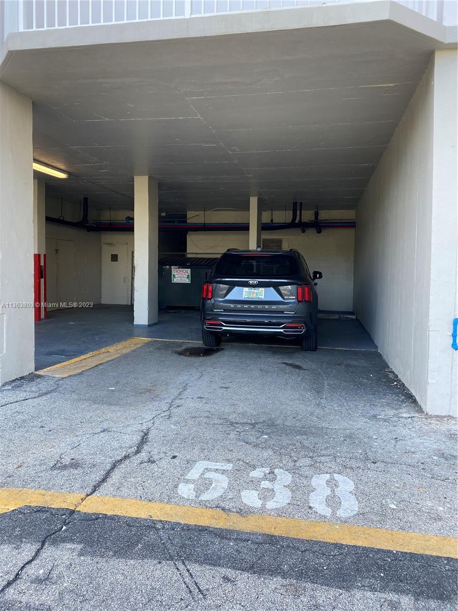 private covered parking - can fit 2 cars