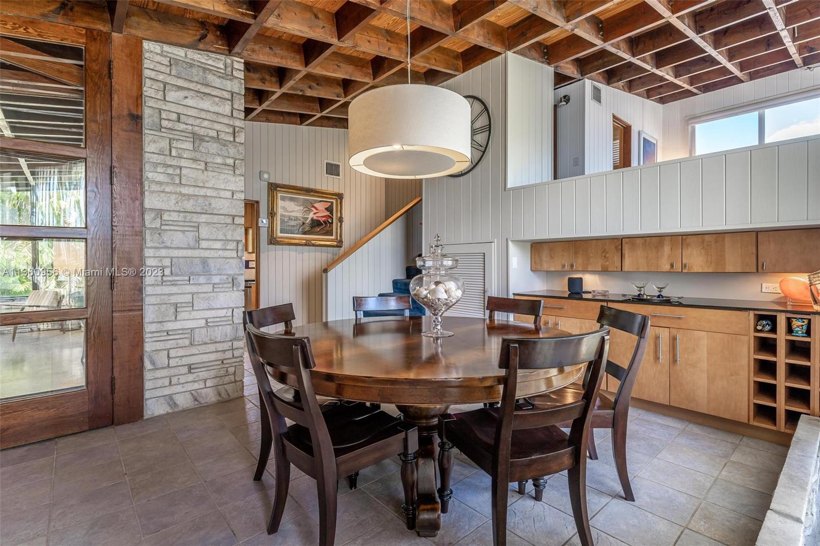 dining area with built-in bar for entertaining