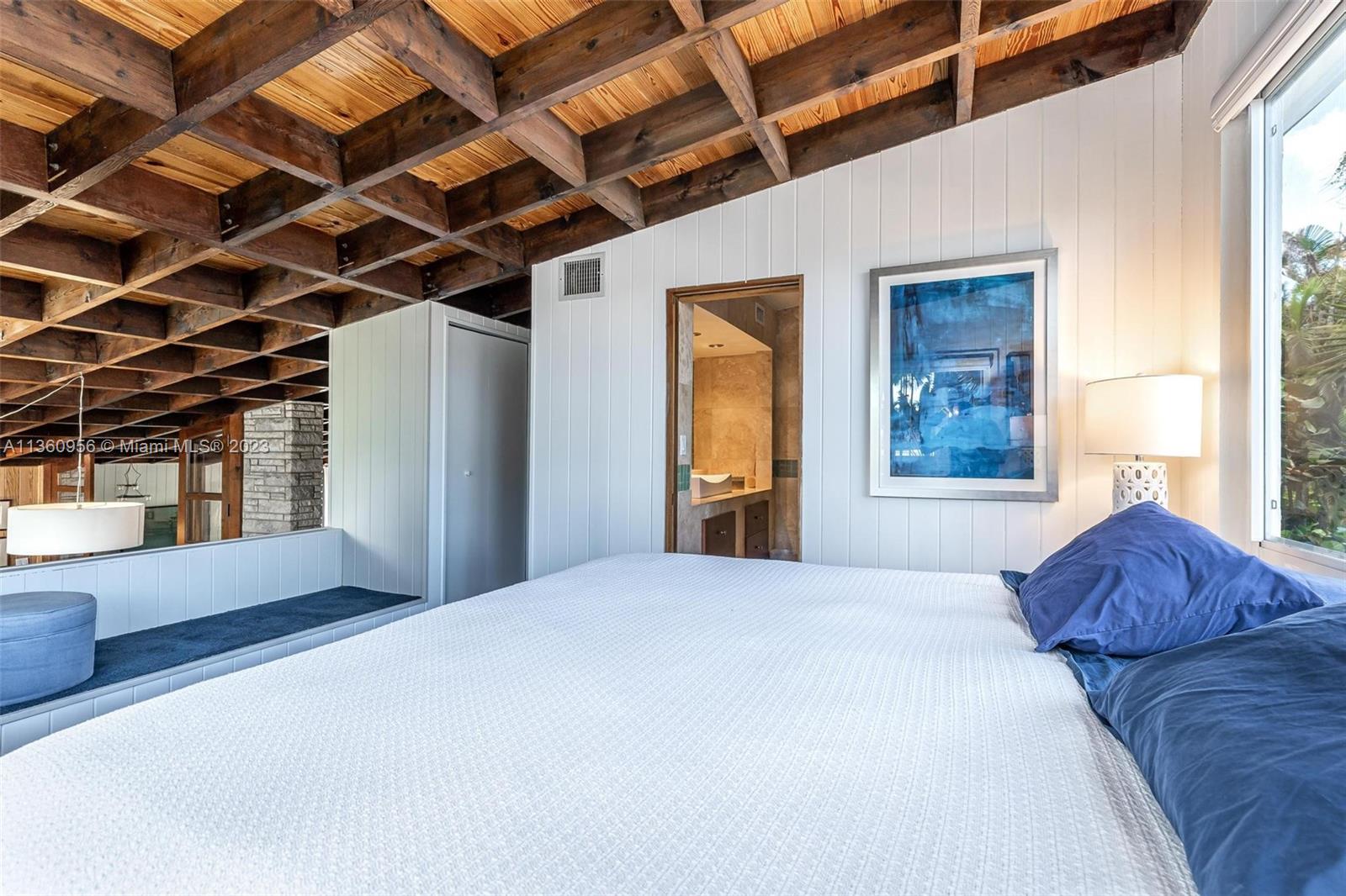 The gorgeous original ceilings continue through the entire space