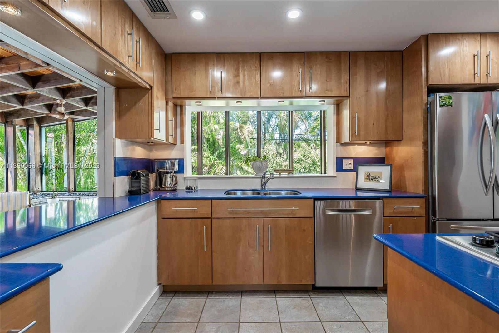 Kitchen overlooking the beautiful outdoor landscaping