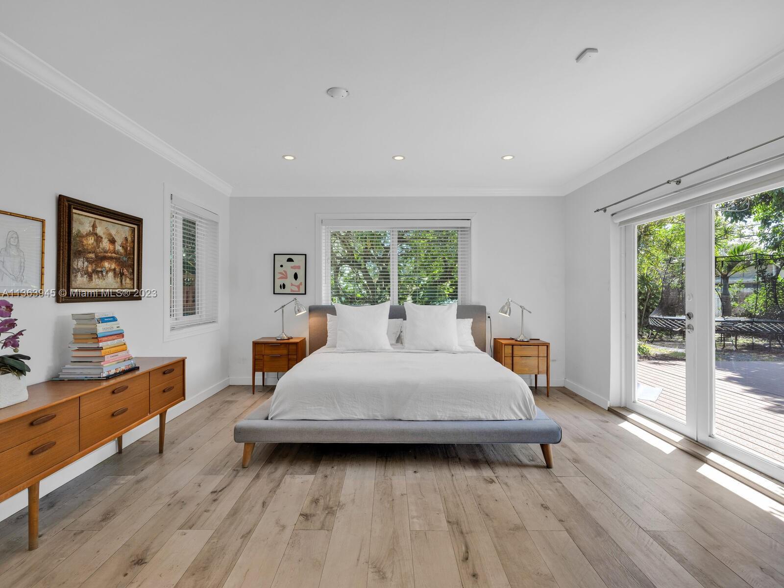 Main Suite w/ French Doors to Back Deck