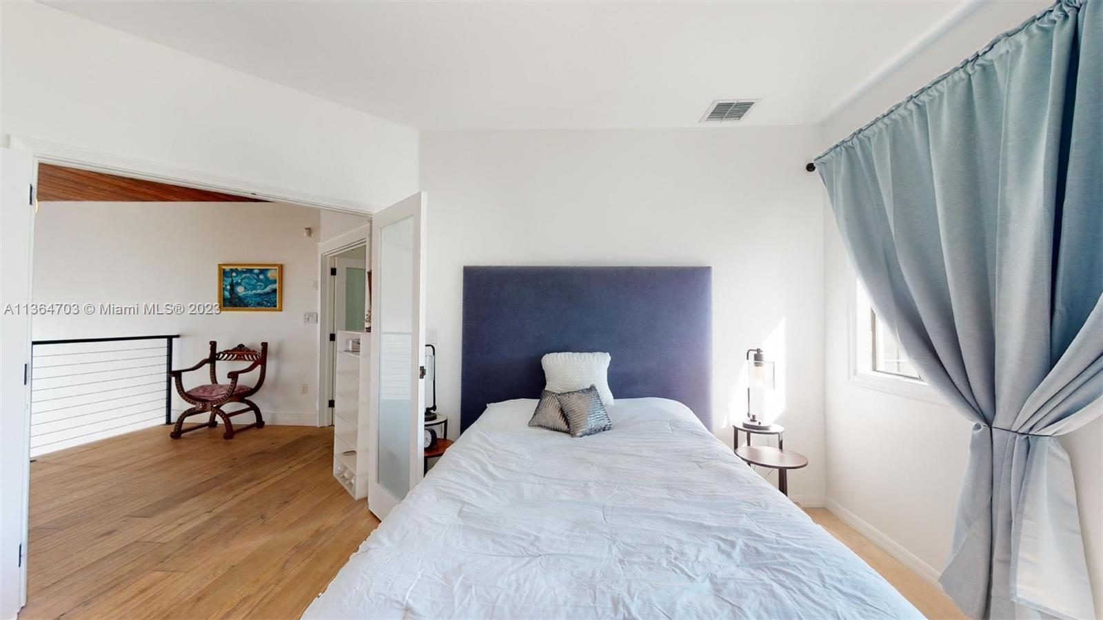 bedroom upstairs with ensuite bathroom