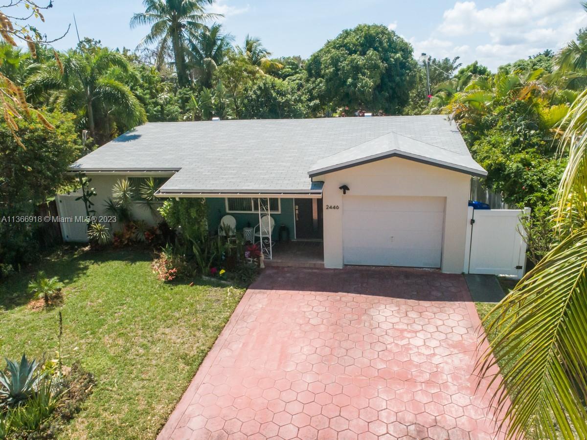 Roof is 9 months old w/three protective layers under the shingles.  PVC privacy fence on sides and front.  Wooden privacy fence in the rear.  Paved driveway.