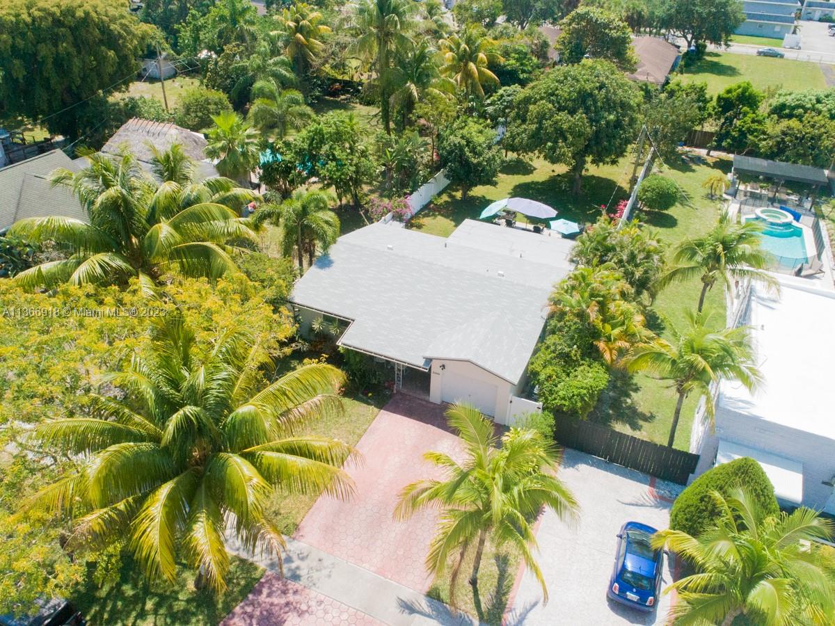 Covered patio.  Locked side gates.  New electric Broton impact garage door.