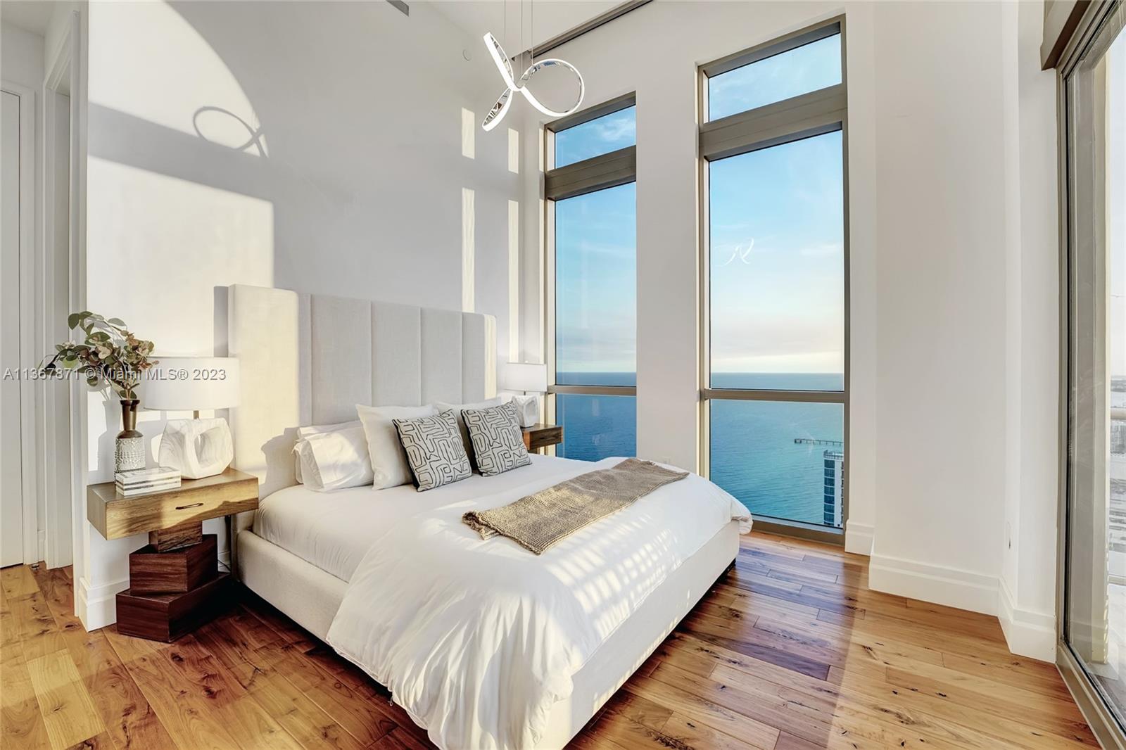 Bedroom 4 with stunning views of the beach, Miami and the intracoastal. Terrace is just steps in front of you. Perhaps a walk out outside for a private swim at the pool?