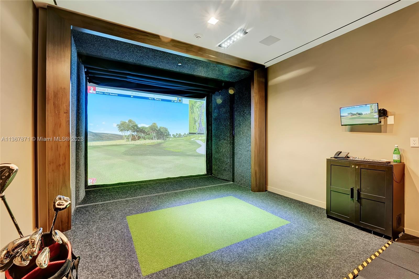 Play golf anywhere in the world in this simulated golf course room for owners.