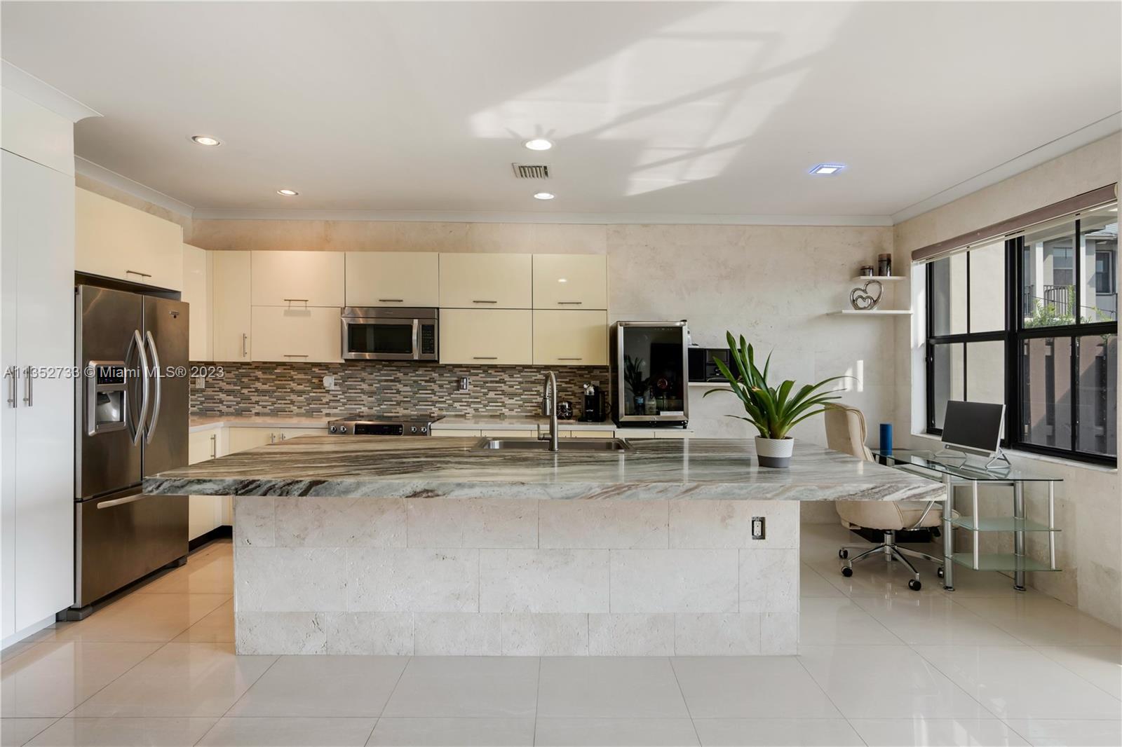 Kitchen with Marble on walls and under the countertop