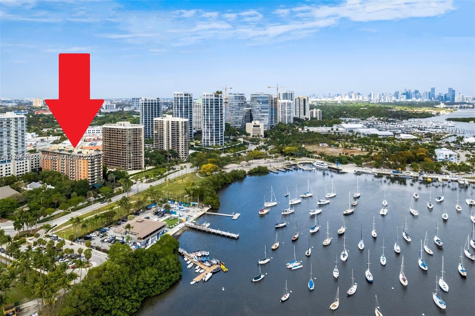 Billionaire's Row, Coconut Grove. Dog OK. Lowest price on Bayshore Drive where homes and condos are valued up to $25,000,000. Yacht clubs, marinas, and a public sailing club directly across the street. Ritz Carlton, restaurants, movies, Fresh Market, CVS, art galleries, UPS store, all within walking distance. Condo is 680 sq. ft. plus refreshing balcony. Investors: rent for any length of stay, even nightly rentals allowed. Room service, valet, lobby restaurant, and concierge all at your fingertips. All furniture stays with the condo. Quick closings. No condo application needed.