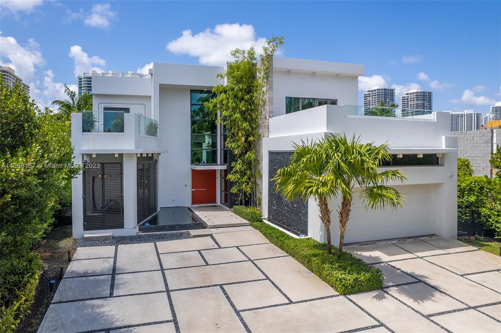 Introducing one of the most stunning homes in the prime location of Golden Beach, FL. This modern masterpiece boasts 75 feet of waterfront and a spacious open floor plan that seamlessly integrates indoor and outdoor living. The turnkey, move-in ready home was built in 2015 and features 5 oversized bedrooms, each with their own en-suite bathroom. The property is just a short walk away from the private beach, perfect for those who enjoy the sun, sand, and surf. With its impeccable design and luxurious finishes, this home is the perfect oasis for those seeking the ultimate in comfort and style. Don't miss out on the opportunity to own one of the most amazing homes in Golden Beach.