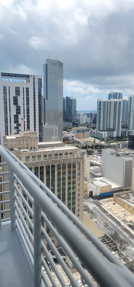 UNOBSTRUCTED 30th FLOOR MIAMI SKYLINE AND BAY VIEWS MANY UPGRADES. Panoramic views with complete privacy from every window of this 2BR/2BA 30th floor SW corner unit. Oversize impact resistant windows and double sliders combined with 10ft high ceilings makes this stylish home light-filled from dawn to dusk (fabulous sunsets). Enjoy the spacious, open plan living space with a stainless steel kitchen and a very sensible split bedroom floor plan. Loft Downtown II features a rooftop pool and gym w/awesome views, lap pool, club room, 24hr front desk & security and garage parking. Two blks to Bayside, 4 blks to Whole Foods, 10 mins. by free Metromover to Brickell City Center, 1.5 miles to Wynwood & 4 miles to SOBE.