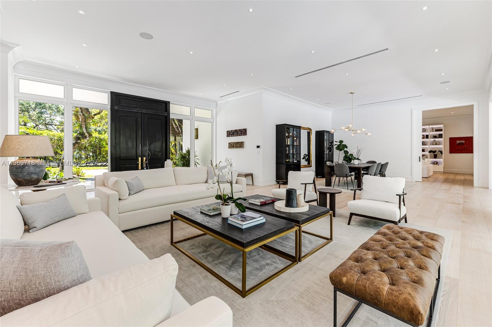 This exceptional 2021 masterfully designed 6BD estate embodies luxury living. The one-story house boasts a 1.3 acre lushly landscaped corner lot. 7580 sq.ft. of bright open spaces elevate the New Traditional Architecture home while integrating natural elements. European oak wood floors add to the warmth & elegance of this masterpiece. Every room & space you could expect in a high standard new construction is there, from office spaces, playroom, live-in quarter, gym, master wing. This home’s unparalleled aesthetic is crafted for those striving to live an exceptional lifestyle. Outside, the impressive mature oak trees provide a calm environment. Spaces offer entertaining/outdoor activity around the beautiful heated pool & covered terrace. Luxury is in the details.