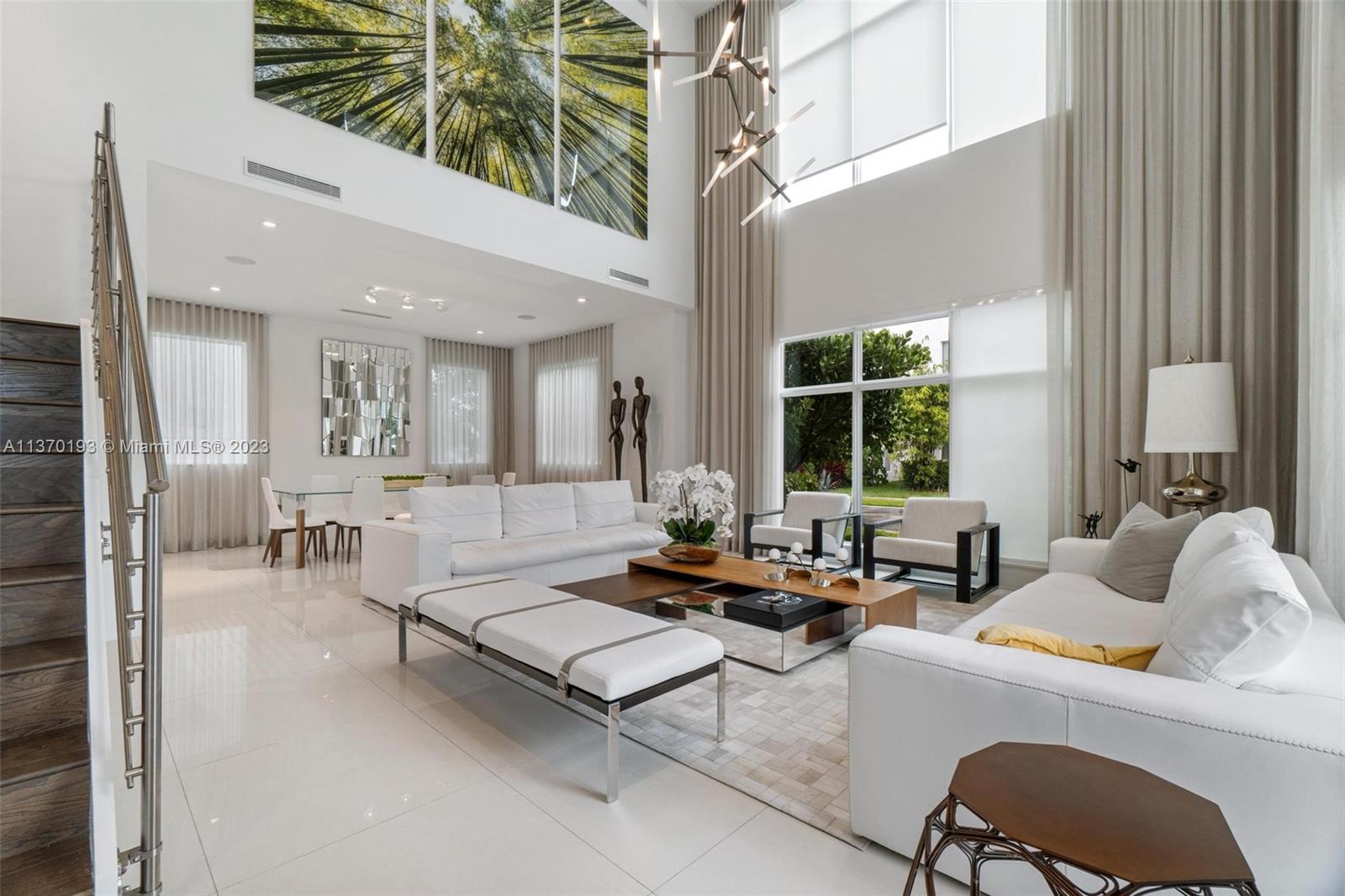 THIS HOME IS ONE OF KIND ITS A MUST SEE: BEAUTIFUL 3 STORIES SINGLE FAMILIY, PREMIUM SIZE CORNER LOT: 5946 SQFT. FULLY FURNISHED by ARTEFACTO, WOLF APPLIANCES, POOL, ROOFTOP DESIGNED FOR FAMILY ENTERTAINMENT, SUMMER KITCHEN AND JACUZZI INCLUDED. Situated on magnificent lots, The Mansions at Doral a gated community gated enclave of 59 customizable, ultra luxurious modern homes. Located on the highly desiderable 107th Avenue in Doral. This is a limited edition home: only 7 models like this were built in the community.