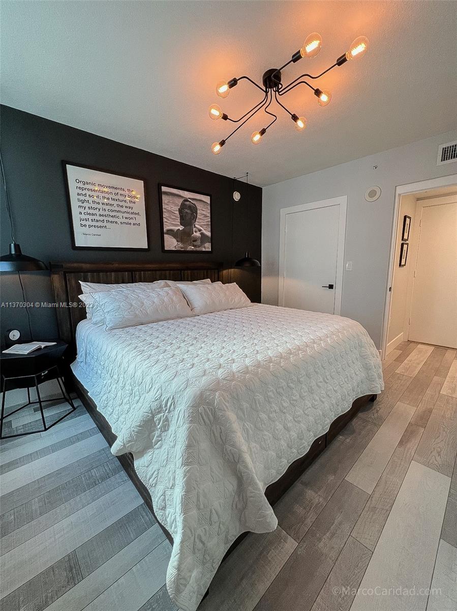 Bedroom with walk-in closet