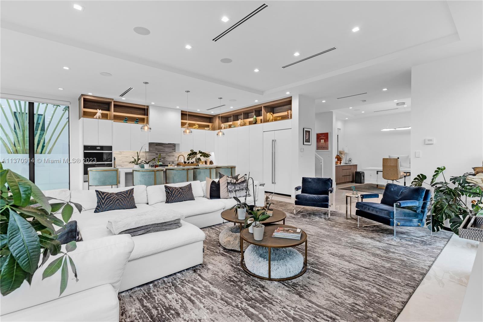 Kitchen seamlessly blends into the living / dining room space.