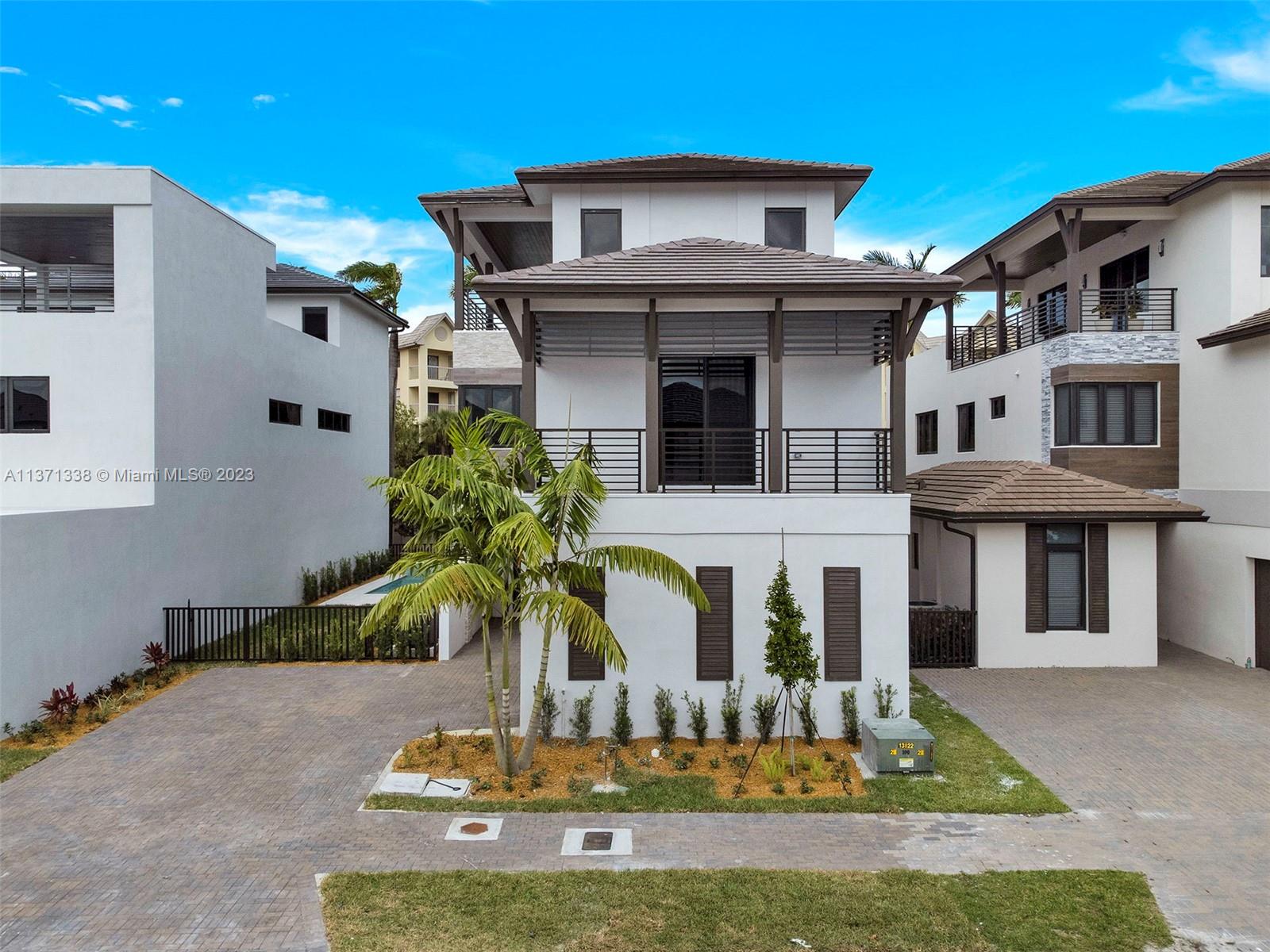This 5 Bedroom/ 5 Bath/ 2 Car Garage/ with Pool & Roof Top Terrace is built to entertain. Located at Canarias
Doral's Luxurious Community, with a full array of amenities, close to shops, restaurants and schools. This is a brand new construction, Capri B model with three stories.