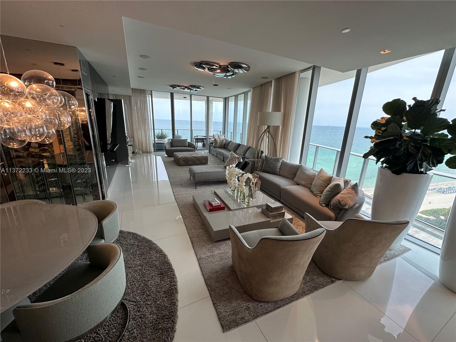 Located directly on the ocean, one-of-a-kind smart residence offers the ultimate in luxury. Offered fully furnished. Nothing like this in the entire building, this 3 bedroom, 4 full & 1 half bathroom 3,340 SF unit (plus balconies) boasts an open layout, unparalleled views of the Atlantic Ocean & Miami skyline, deep terraces perfect for entertaining or enjoying life on the ocean’s edge. Features include a wine cooler, an expansive principal bedroom w/ an office/make up area, spa-like bathroom, boutique style closets, wine cooler, floor-to-ceiling windows framing stunning views, private elevator, chef’s kitchen w/top-of-the-line appliances. Residences have access to luxury concierge services by Chateau, business center, private restaurant, private cinema, Kids’ club, fitness center & spa.