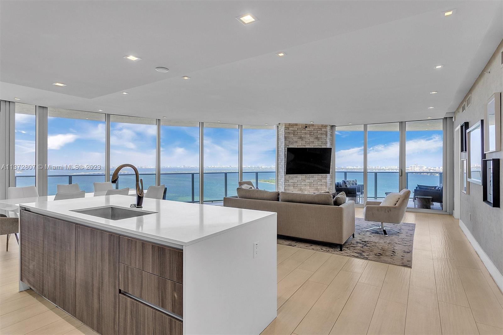 One of a kind 3 beds/ 4 baths + den with breathtaking views of the Ocean, Miami Skyline & Miami Beach. Developer condo with owner upgraded finishes. Featuring private elevator / foyer with camera system logibeth in the foyer, living & dining room area, high ceilings, porcelain floors all throughout a wraparound balcony. Top of the line appliances,smart locks, bar cobinets, extra cooler and fridge, built-in closets, window treatments in all bedrooms and social area. Enjoy top amenities with sunset pools, kids/teen playroom, movie theater, conference rooms, fitness center and more. ALSO AVAILABLE FOR RENT.