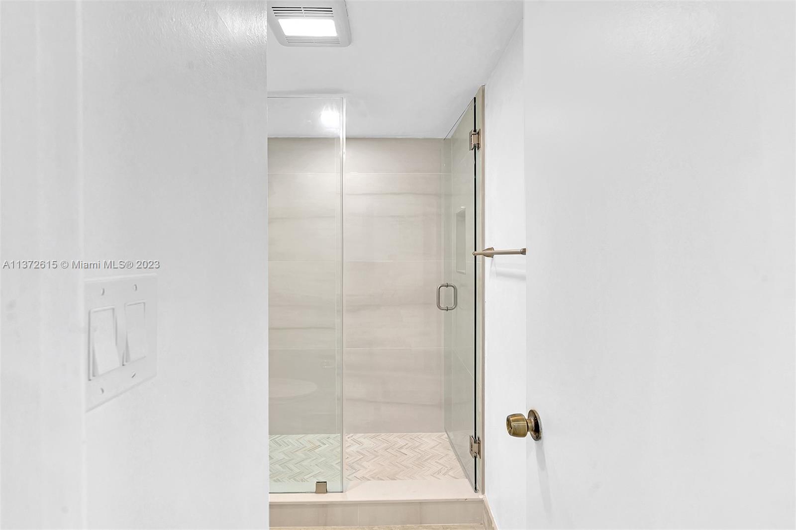 Elegant Glass enclosed shower.